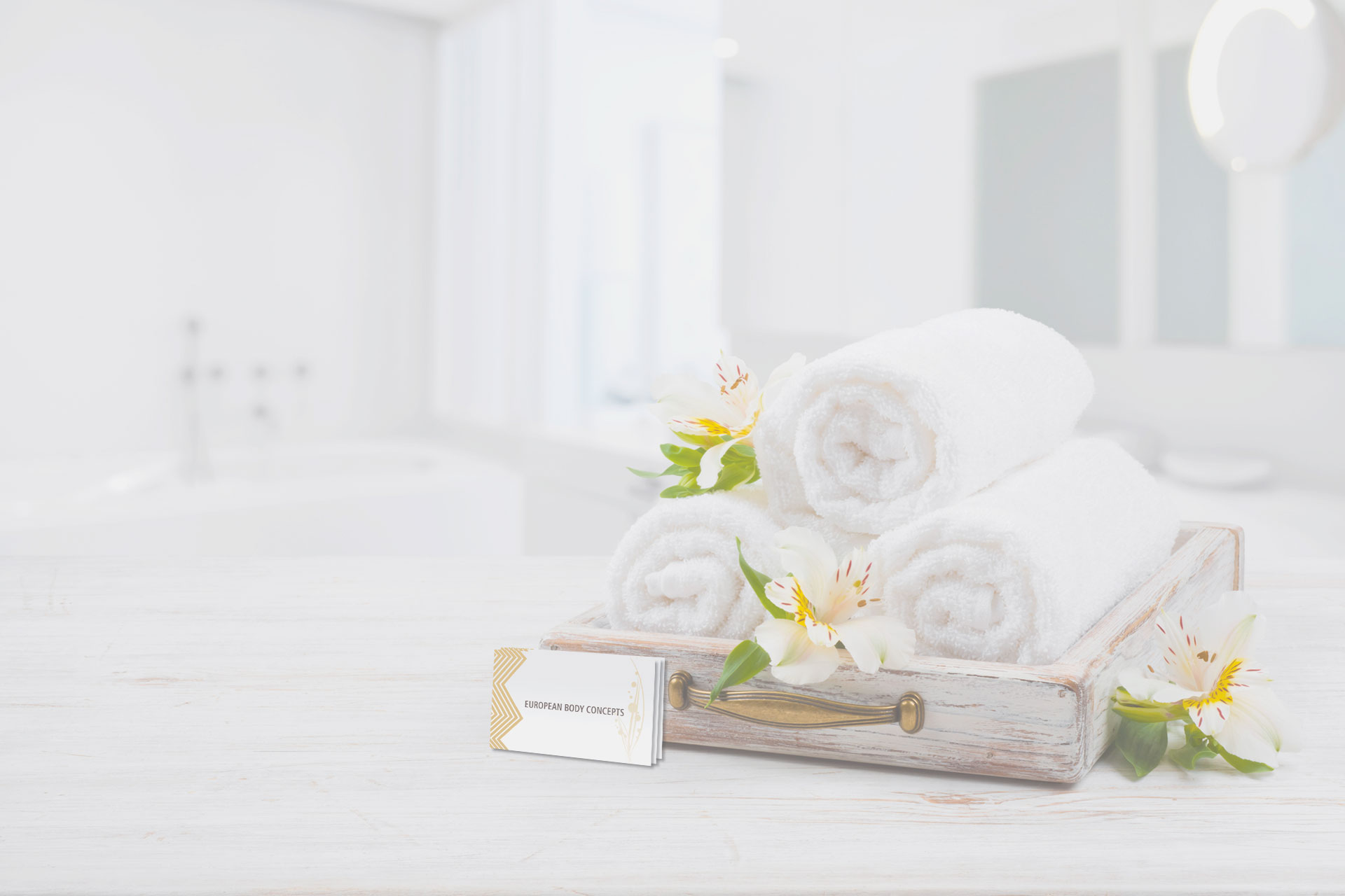 White spa towels in a tray